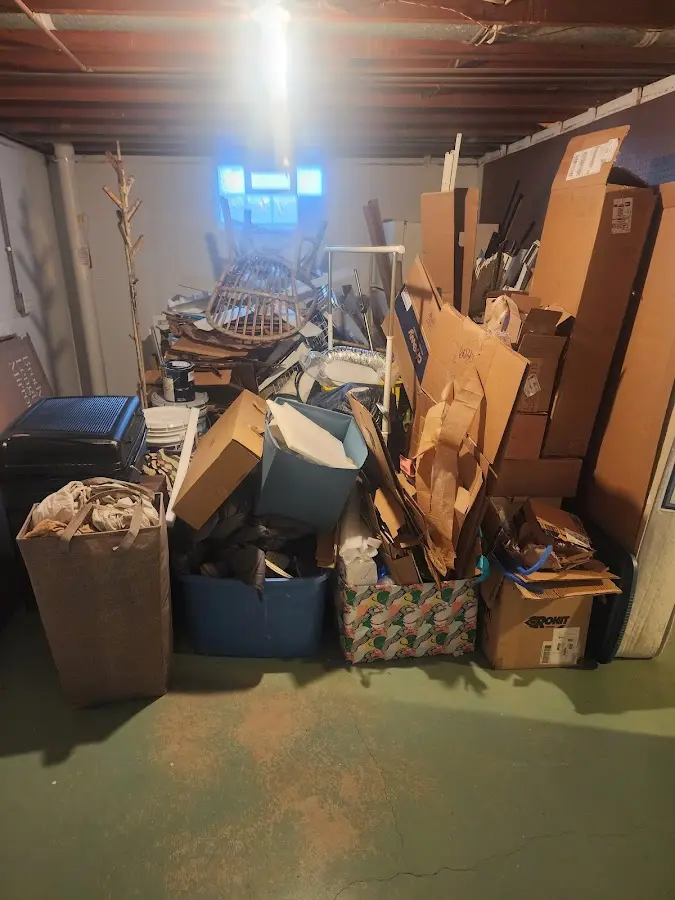 Roll-off dumpster container at job site for Concrete Dumpster Rental in Linton